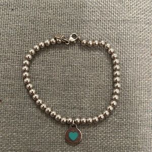 Authentic Tiffany’s Silver Beaded 4mm Bracelet with blue Heart Tag.